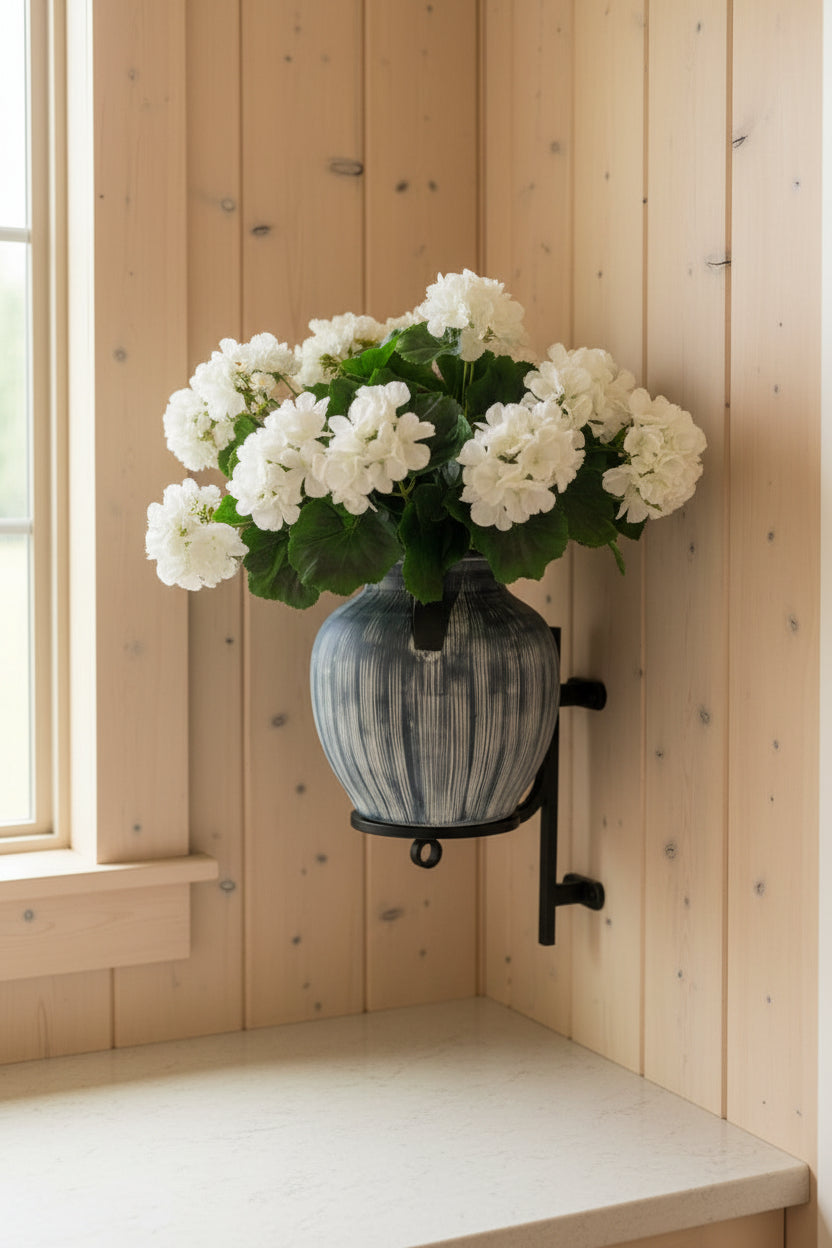 Geranium Arrangement in Black Ribbed Vase